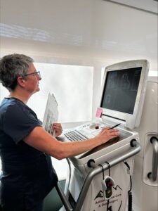 Dr. Redman looks at a screen where she reviews a CT scan
